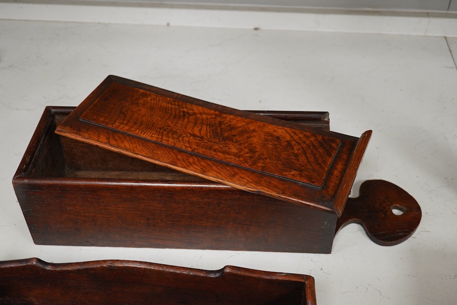 A George III mahogany cutlery tray, together with an oak hanging candle box, largest 48cm high. Condition - fair to good